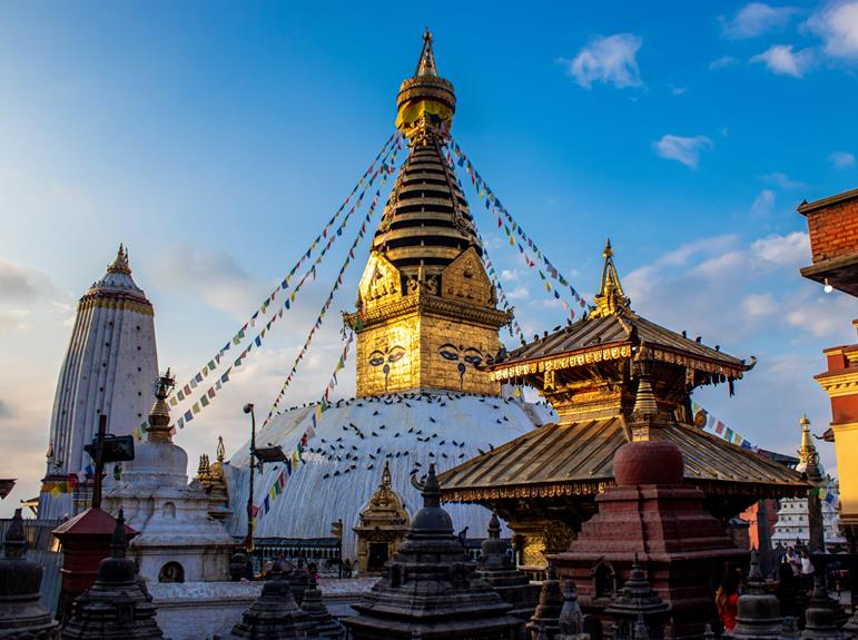 Swayambhu, also called Swayambhunath or the Monkey Temple, is an ancient stupa in Kathmandu, Nepal. It’s a UNESCO World Heritage Site and one of the most sacred Buddhist sites. The stupa sits atop a hill, offering a panoramic view of the Kathmandu Valley. Swayambhu means "self-existent" in Sanskrit, as it is believed to have appeared on its own. It is visited by both Buddhists and Hindus and is known for its peaceful environment, prayer flags, and many monkeys living around the temple.